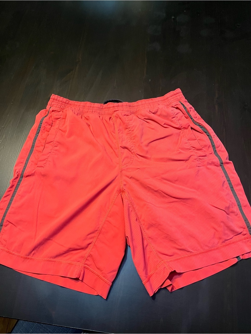 lululemon athletica Coral Red Athletic Shorts with Gray Side Stripe - Picture 2 of 8